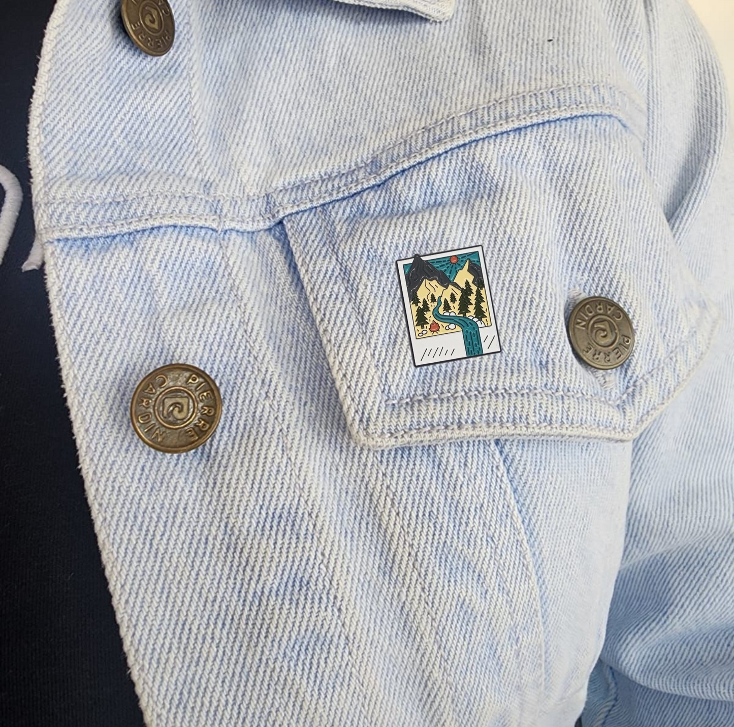 Pin polaroid con paisaje