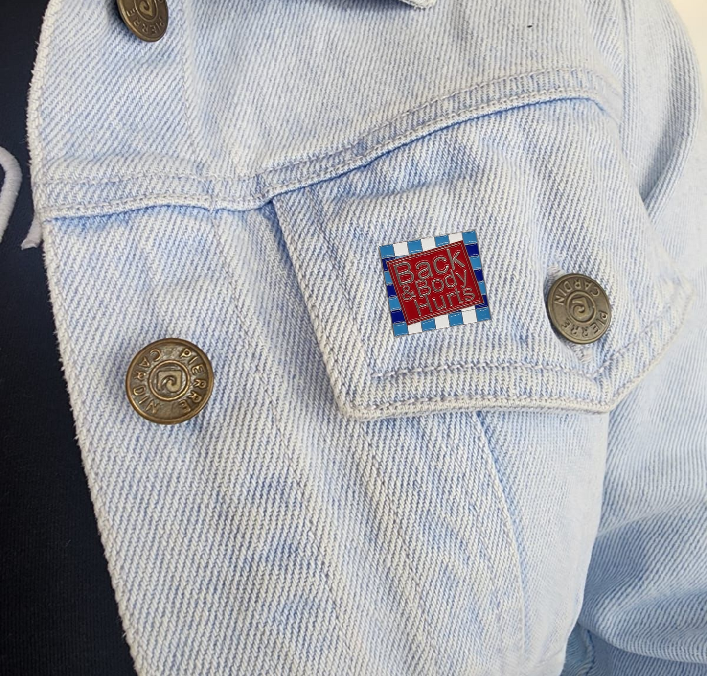 Pin back & body hurts