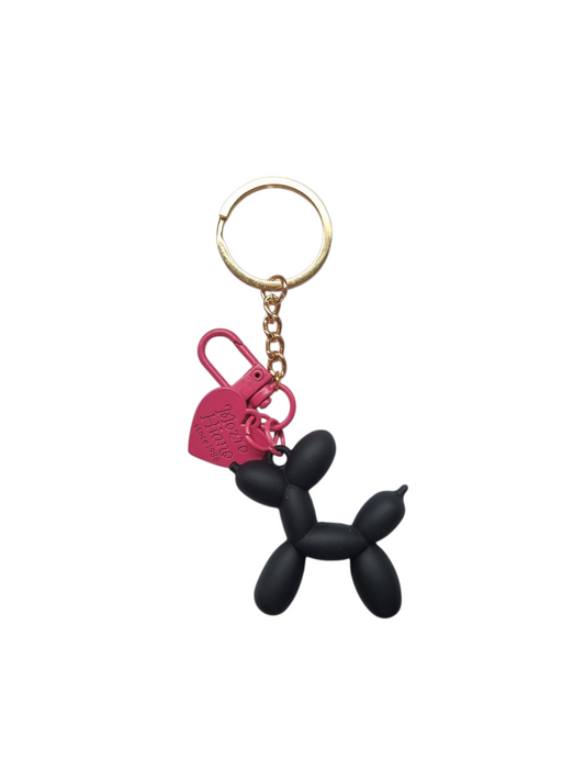 Llavero perrito brillante negro con fucsia